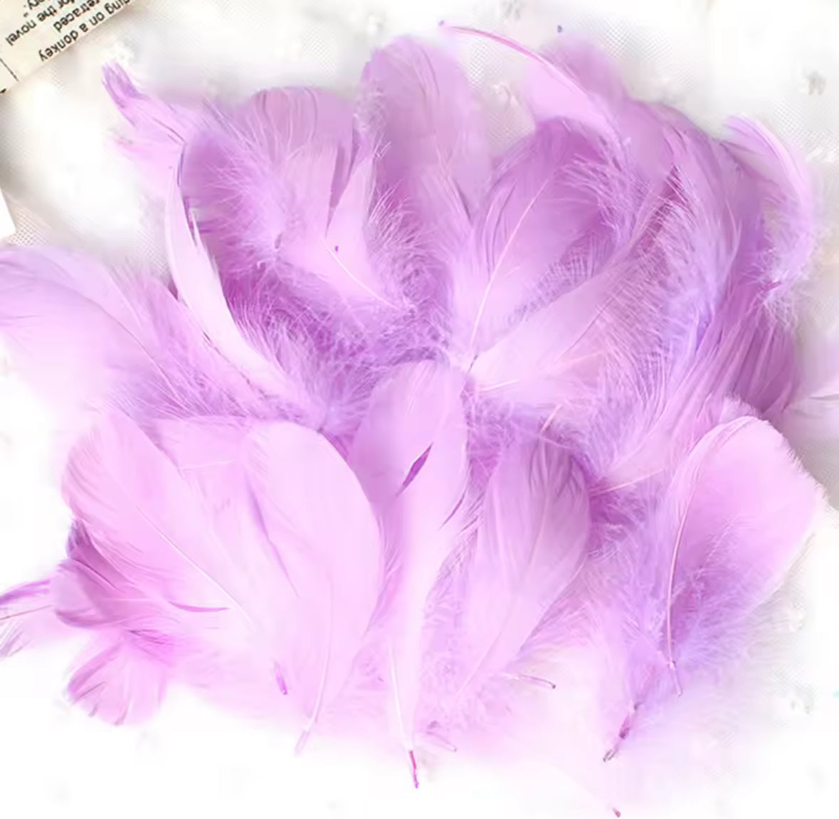 Clear Bobo Balloons 10pc + Feathers insert 50pc included.